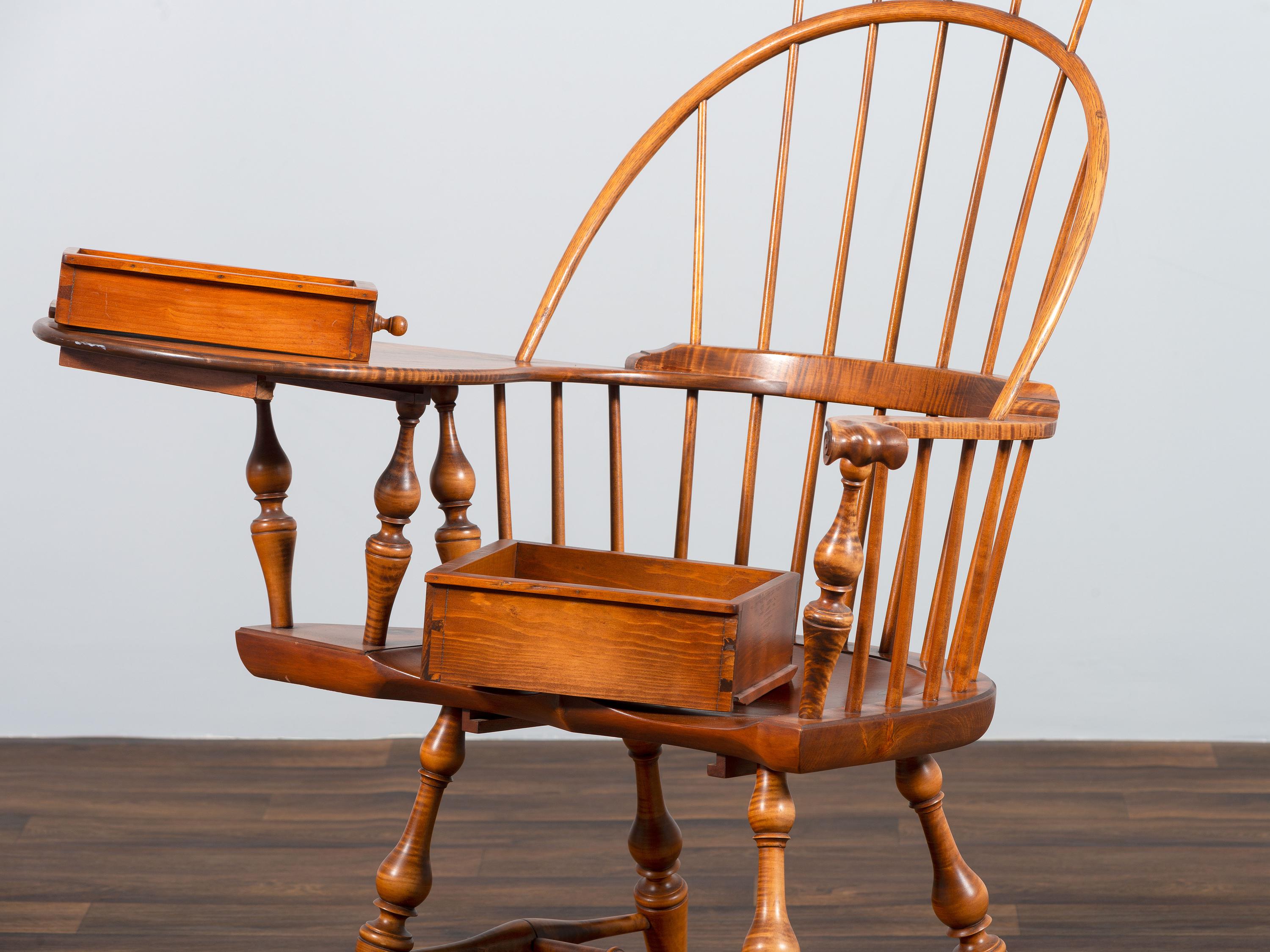 A D.R. Dimes Turned and Volute Carved Tiger Maple Windsor Three-Back Writing Armchair