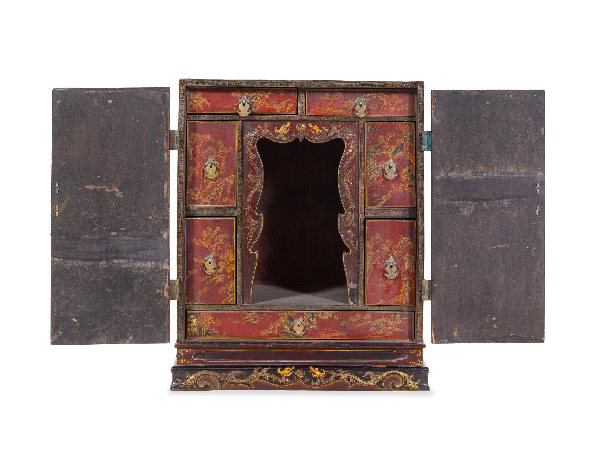 A Polychrome and Gilt Lacquered ‘Landscape’ Kang Cabinet