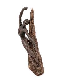 A Cast-Bronze and Wood Figure of a Male Dancer