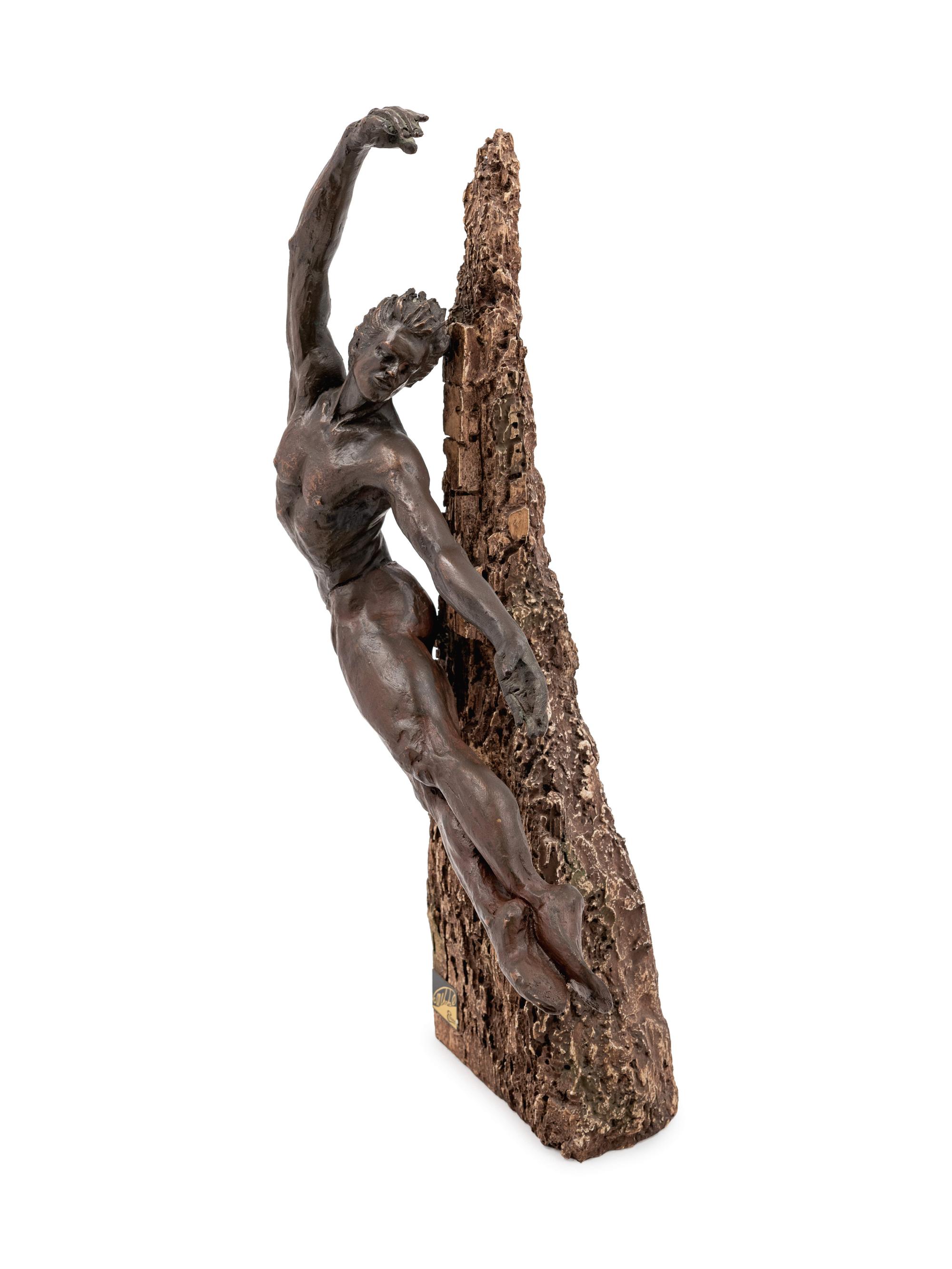 A Cast-Bronze and Wood Figure of a Male Dancer