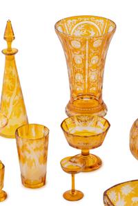 A Bohemian Amber Etched Glass Table Service