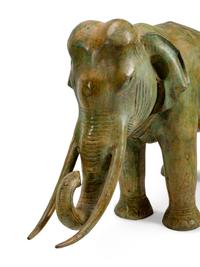 A Large Pair of Patinated Bronze Elephants