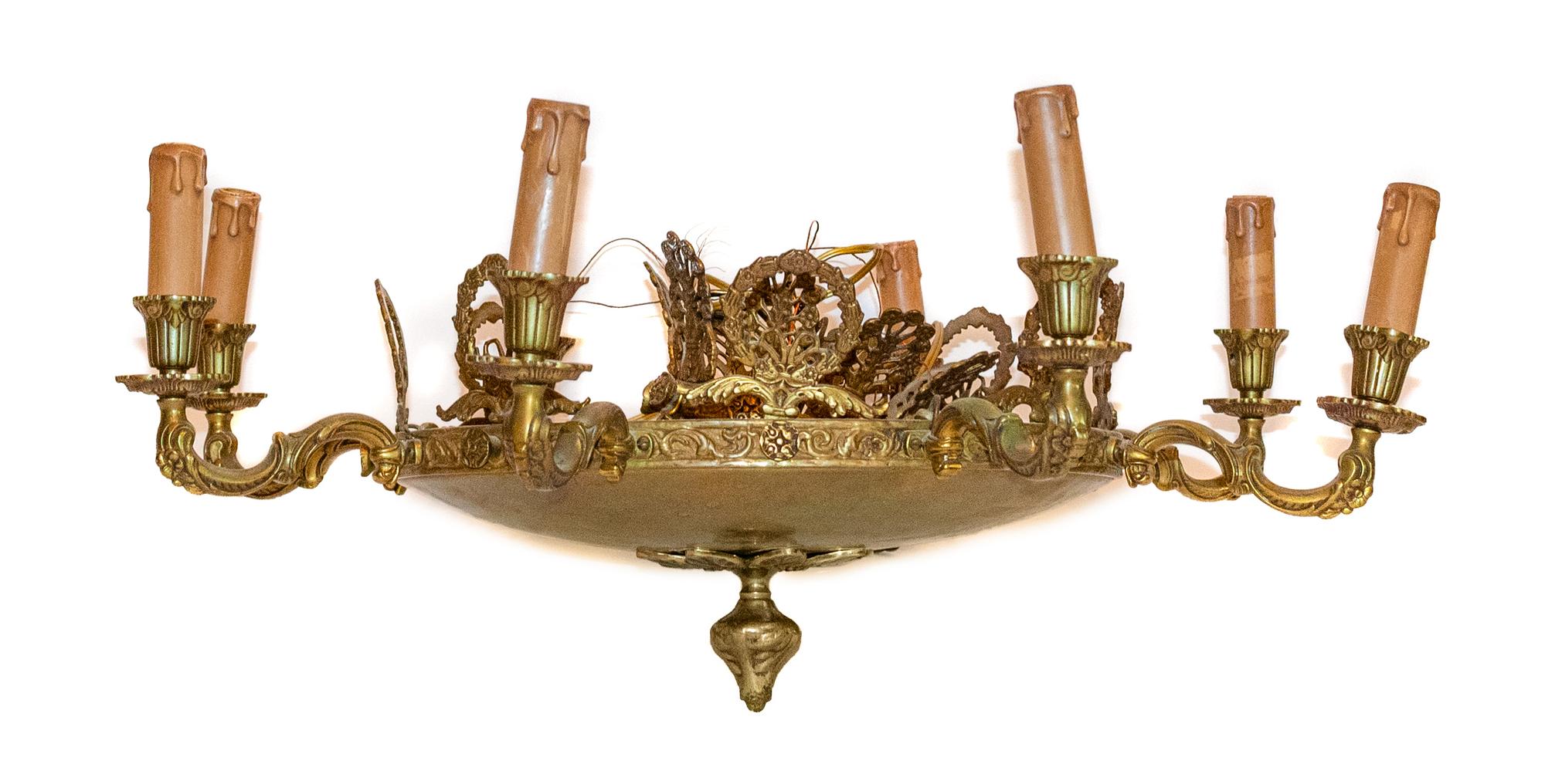 An Empire Style Gilt Metal Eight-Light Chandelier