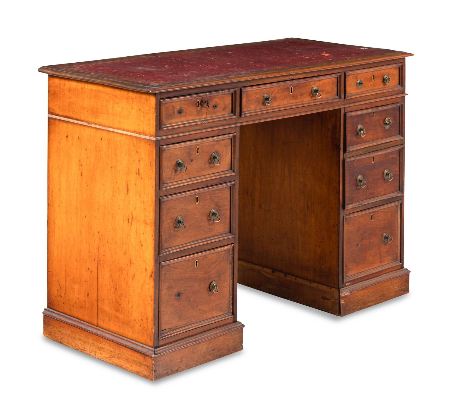 An Edwardian Walnut Pedestal Desk