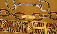 A Pair of Gucci Silk Scarves, 34" x 34".