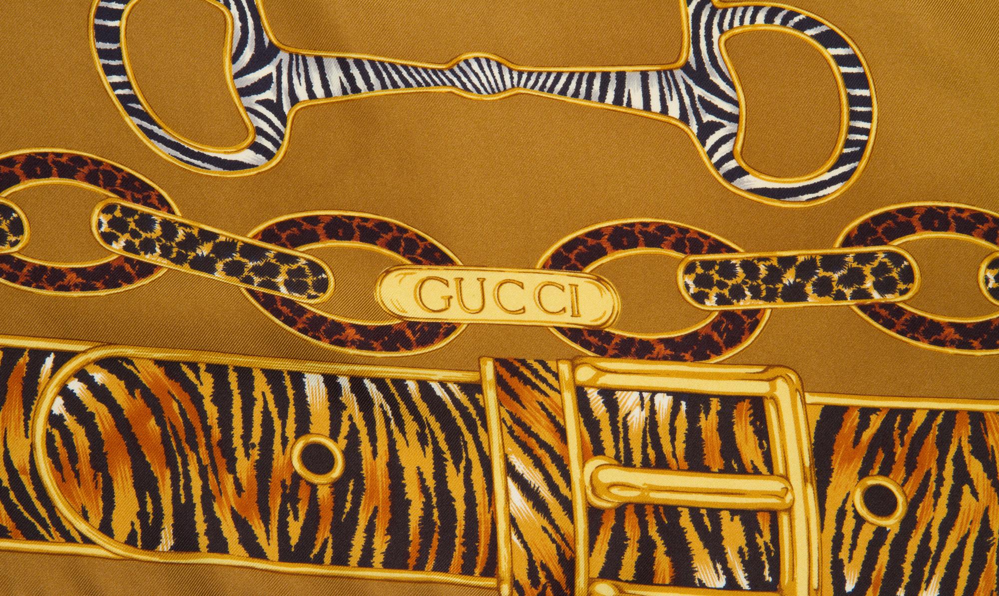 A Pair of Gucci Silk Scarves, 34" x 34".