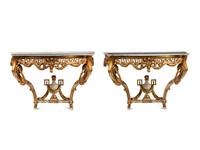 A Pair of Italian Neoclassical Style White Painted and Parcel Gilt Marble-Top Console Tables