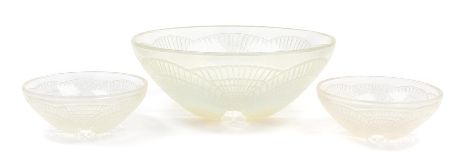 A Set of Three R. Lalique Molded Glass Bowls Diameter of largest 9 inches.