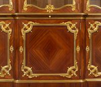 A Louis XV Style Gilt Bronze Mounted Kingwood Breakfront Cabinet