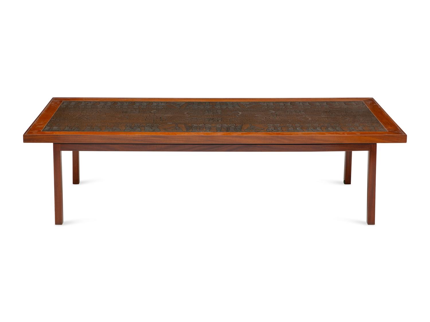 A Scandinavian Modern Teak Low Table with Egyptian Motif Stamped Copper Top