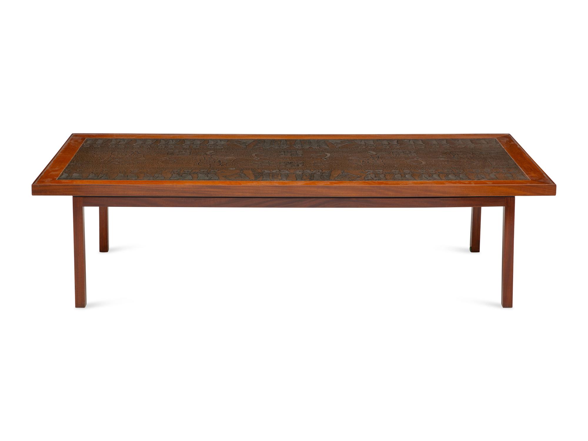 A Scandinavian Modern Teak Low Table with Egyptian Motif Stamped Copper Top