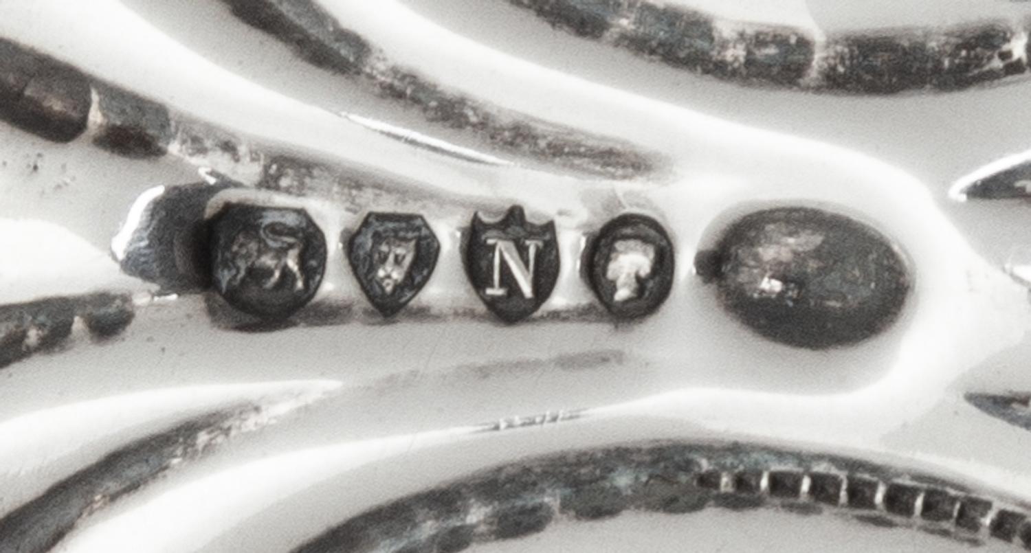 A Victorian Silver Mounted Tortoise Shell Page Turner, Maker's Mark Obscured, London, 1888, the handle worked to show foliate scrolls.