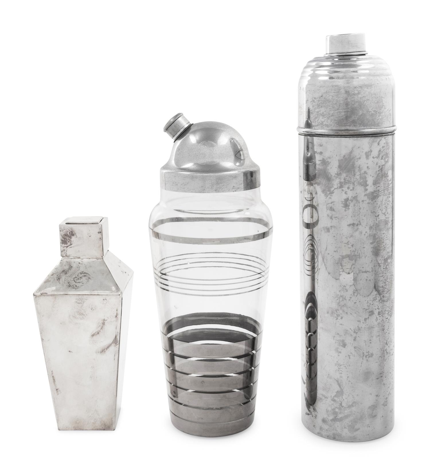A Group of Three Cocktail Shakers