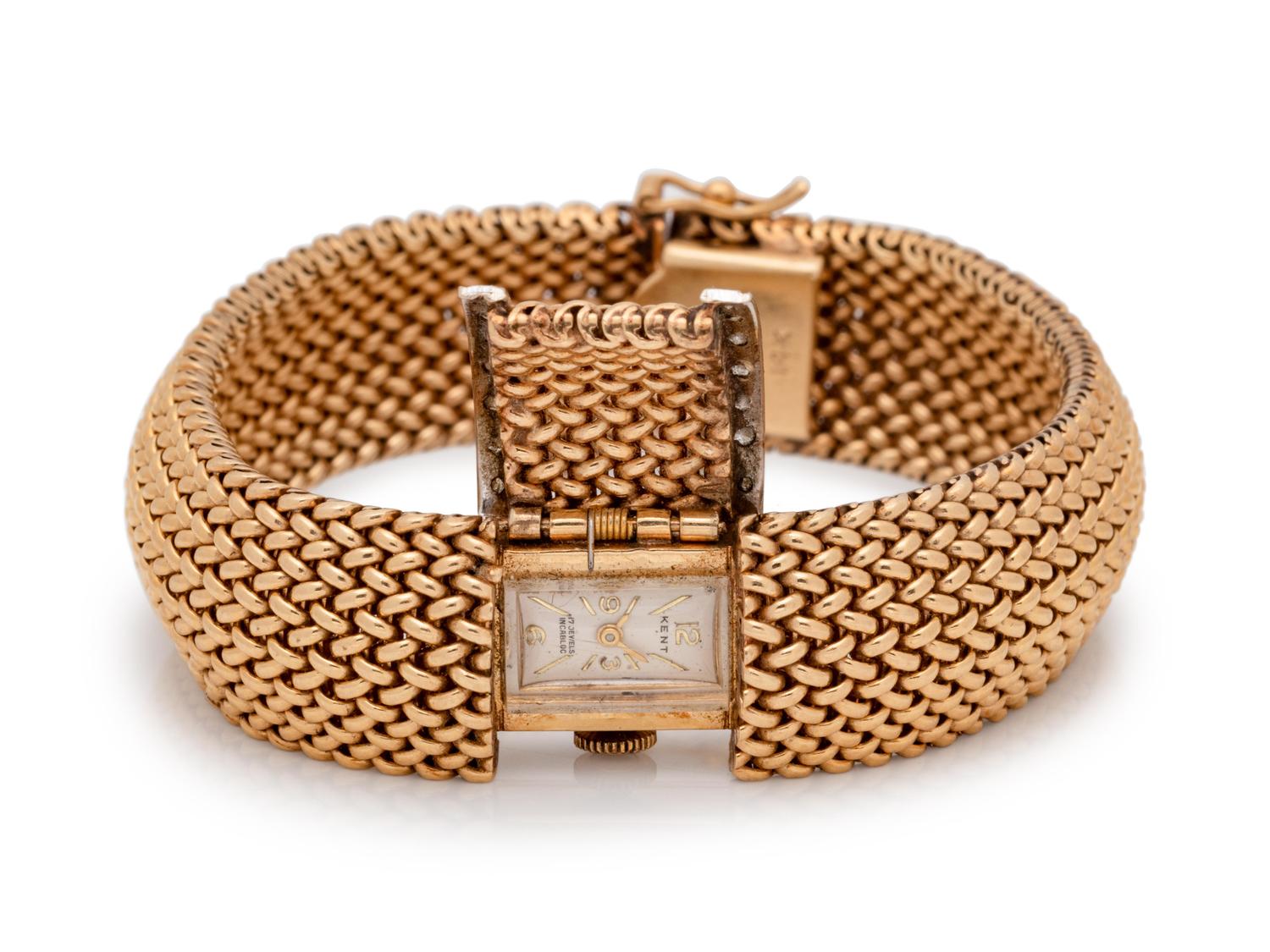 A 14 Karat Yellow Gold and Diamond Surprise Wristwatch, Kent,