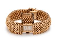 A 14 Karat Yellow Gold and Diamond Surprise Wristwatch, Kent,