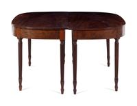 A Pair of Federal Mahogany Demilune Tables