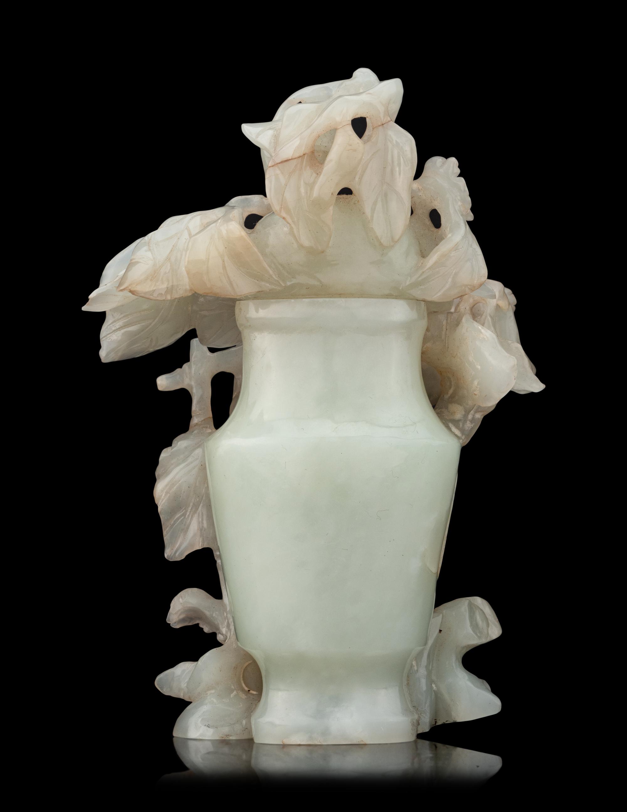 A Small Chinese Openwork Pale Celadon Jade Covered Vase