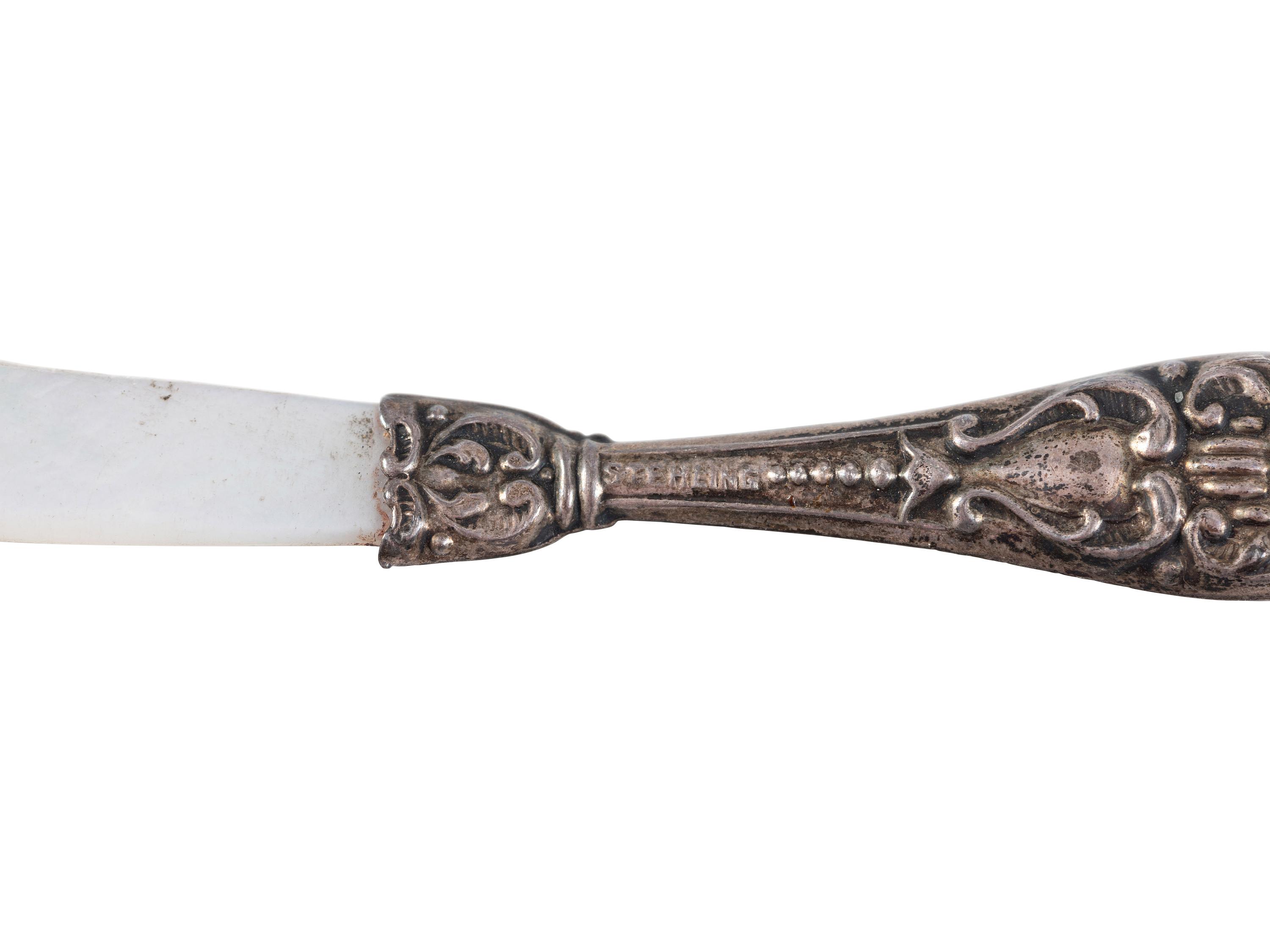 Twenty Silver Serving Utensils
