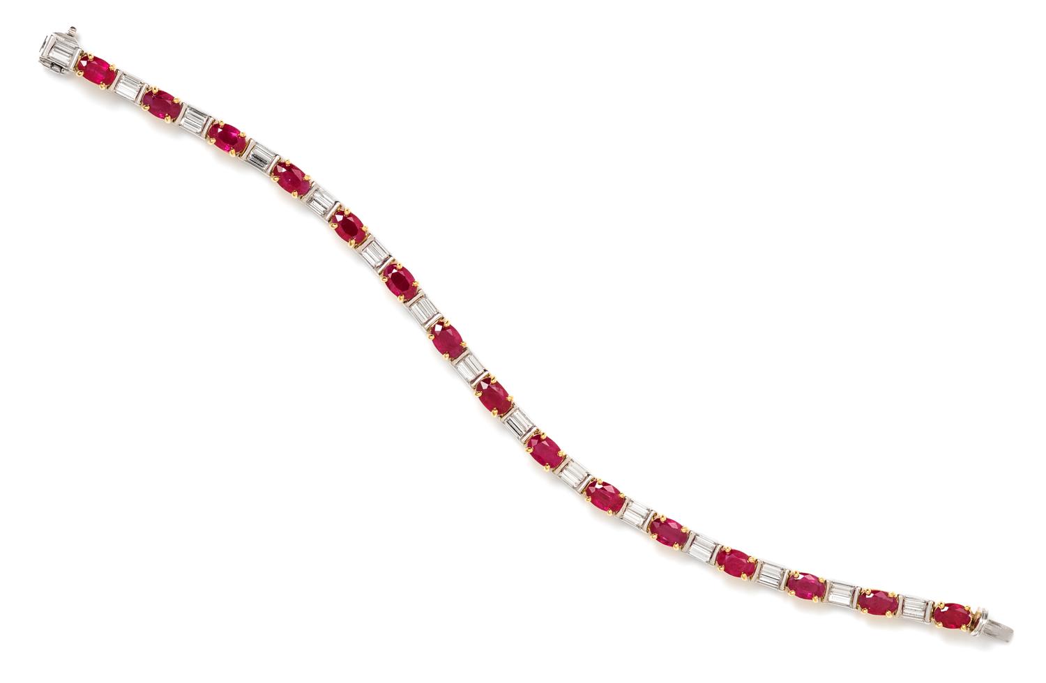 A Platinum, 18 Karat Yellow Gold, Ruby and Diamond Line Bracelet, 12.75 dwts.