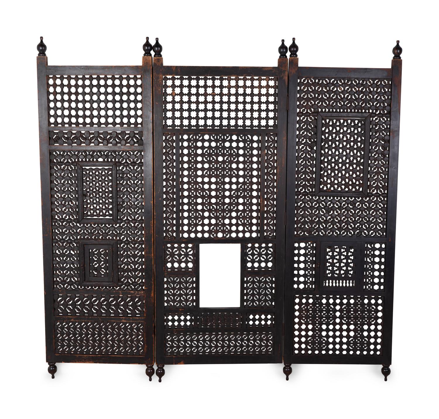 An Indian Pierced Carved Teak Three-Panel Floor Screen — 20TH CENTURY
