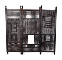 An Indian Pierced Carved Teak Three-Panel Floor Screen — 20TH CENTURY