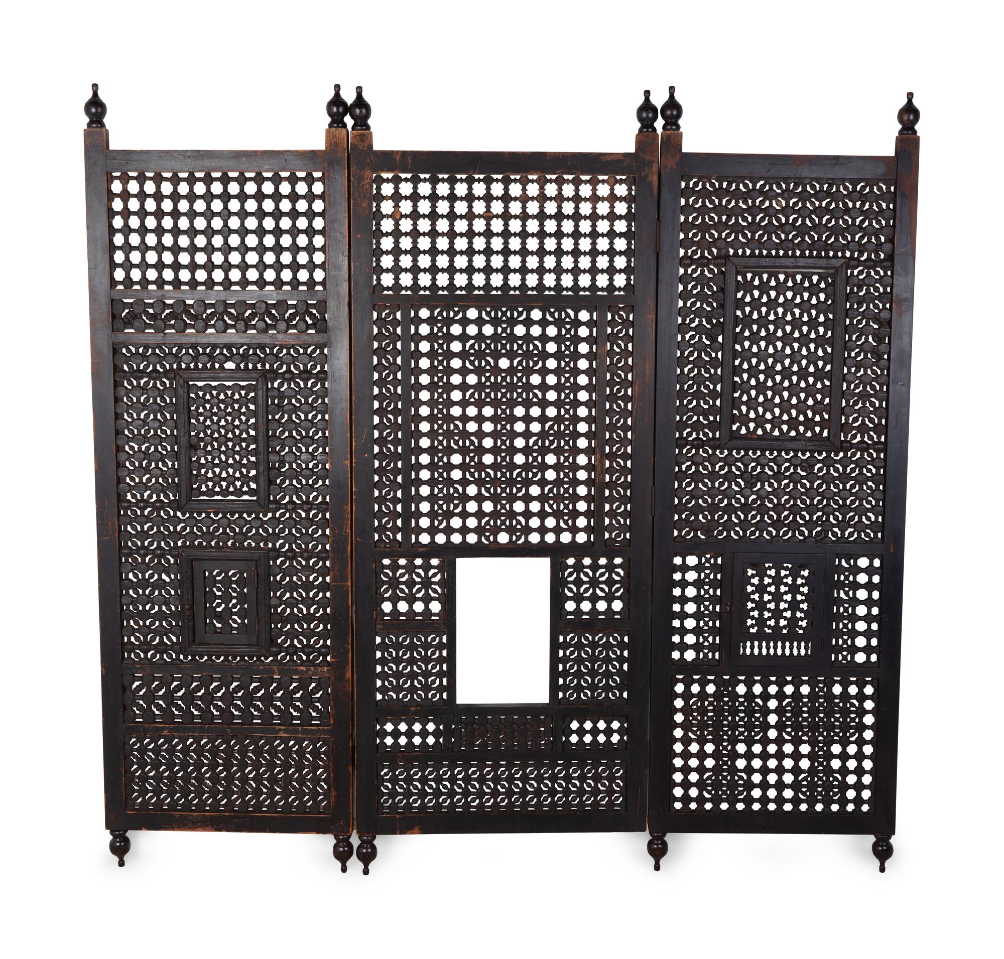 An Indian Pierced Carved Teak Three-Panel Floor Screen — 20TH CENTURY