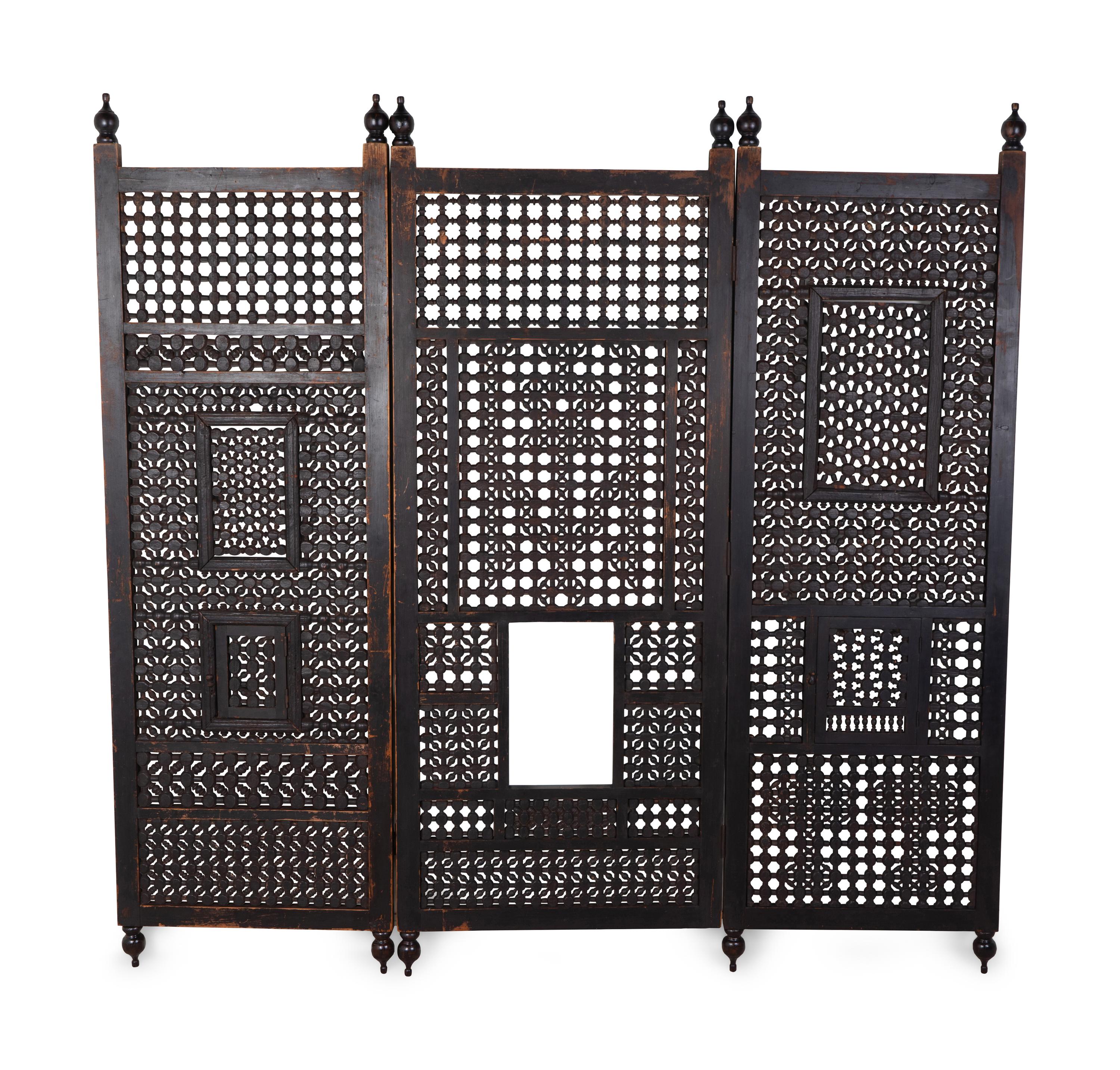 An Indian Pierced Carved Teak Three-Panel Floor Screen — 20TH CENTURY