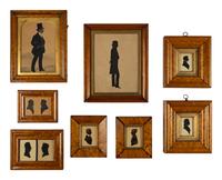 A Collection of Eight Silhouettes in Maple Frames