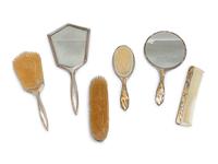 A Group of Art Nouveau Silver Dresser Objects Including Mirrors, Brushes and Combs