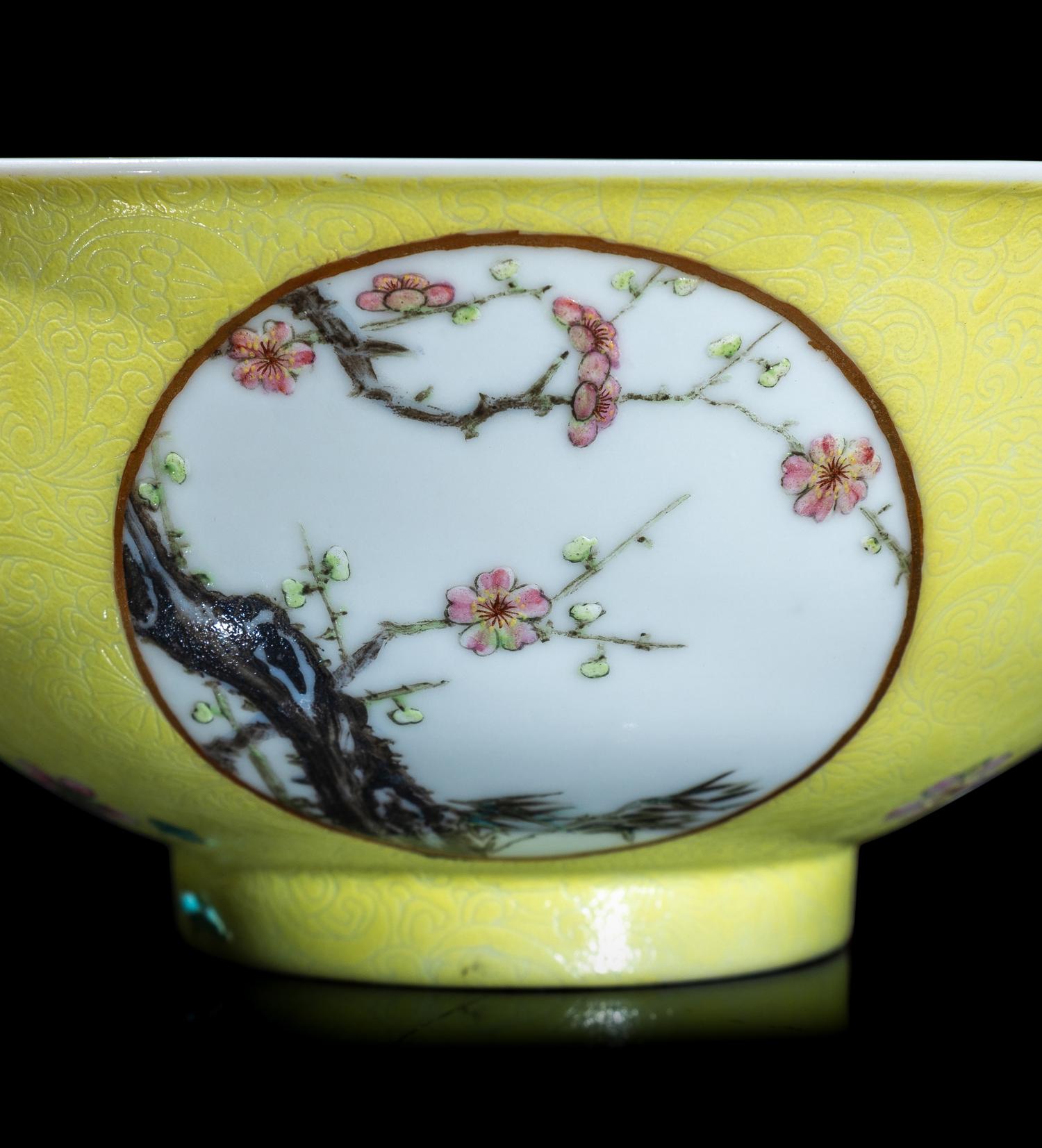 A Pair of Chinese Sgraffito Ground Yellow Glazed Famille Rose Porcelain 'Floral' Bowls, Late 19th/early 20th Century 晚清/民國 黃地軋道開光花卉紋碗一對