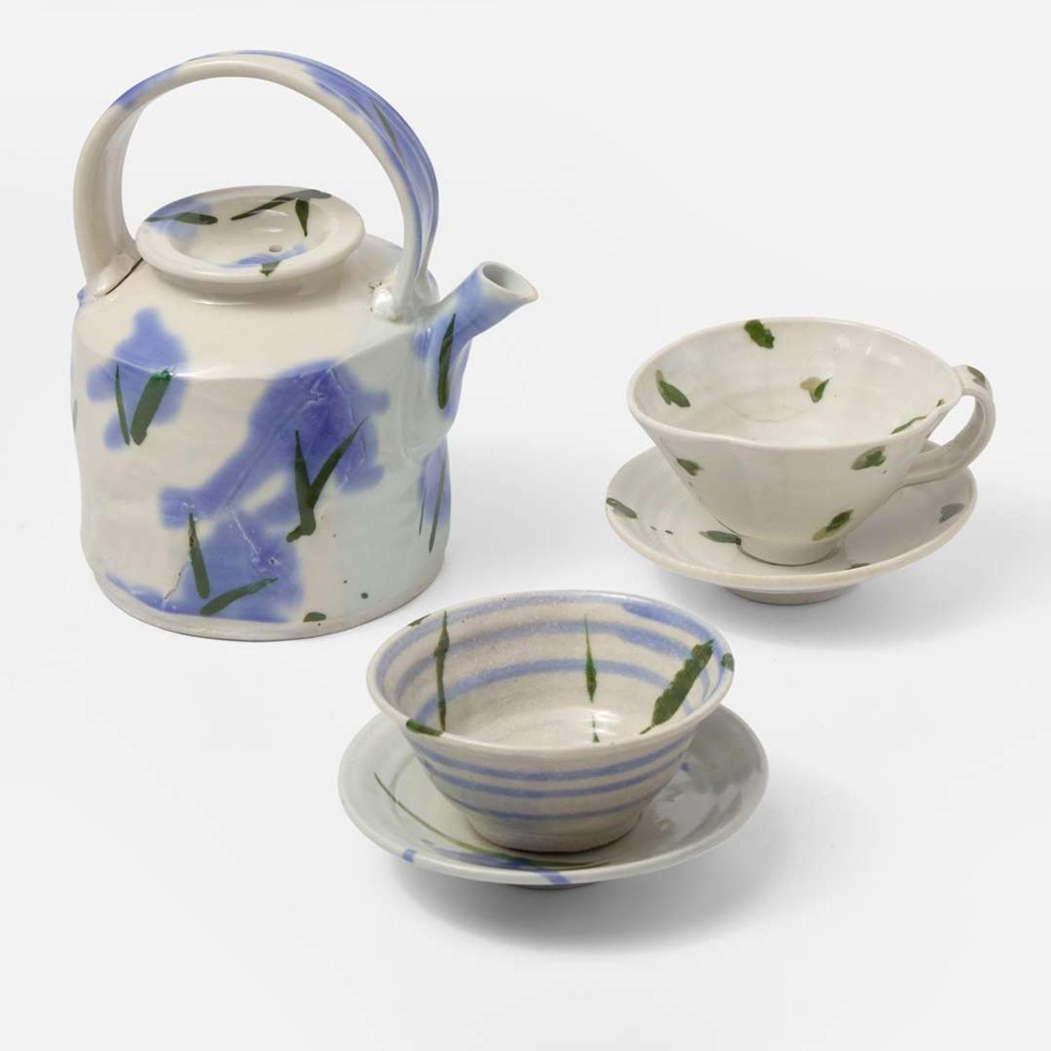 Betty Woodman (American, 1938-2018) Teapot and Two Cups and Saucers, USA, circa 1980