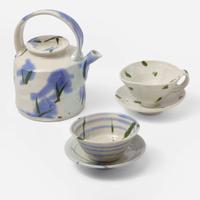 Betty Woodman (American, 1938-2018) Teapot and Two Cups and Saucers, USA, circa 1980