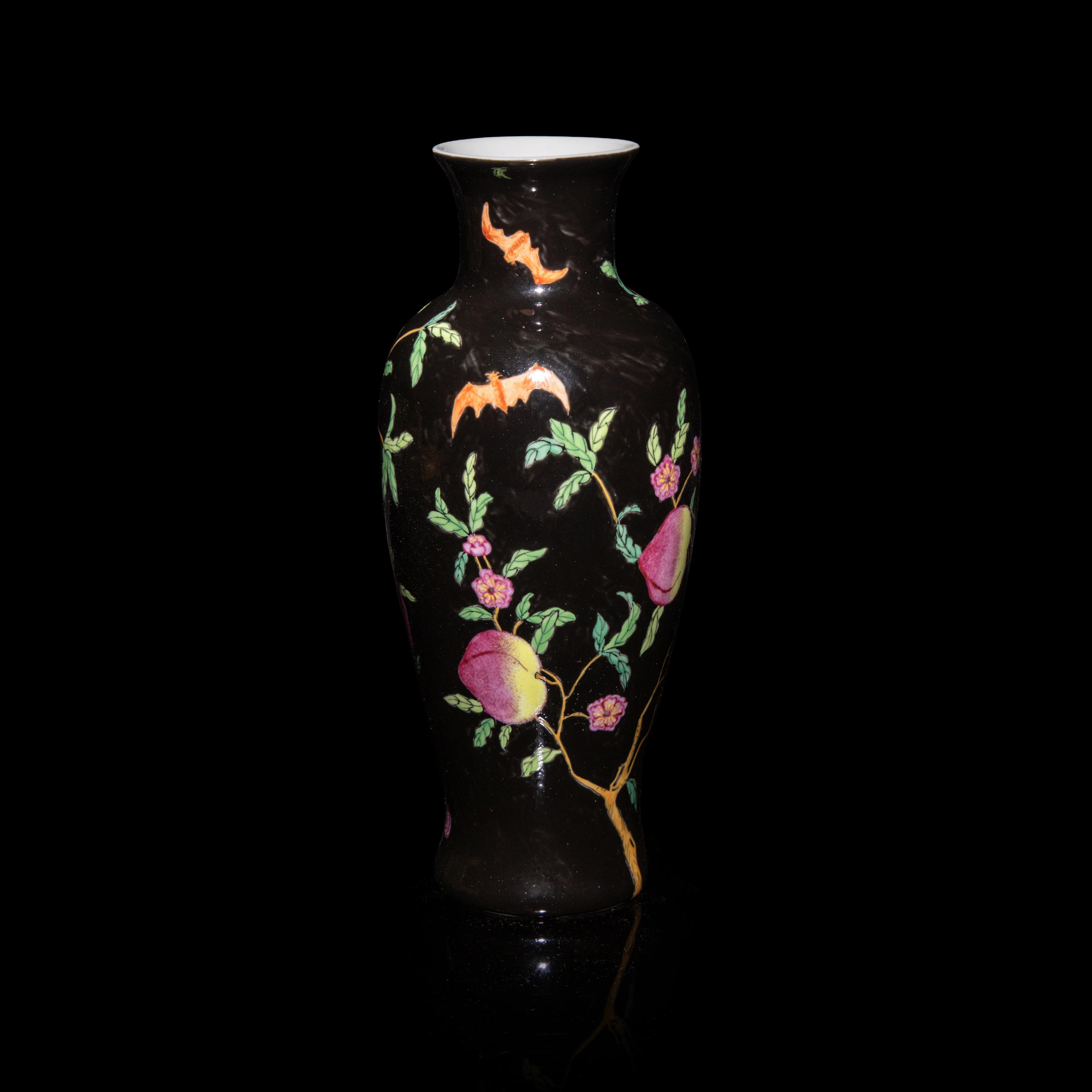 A Chinese Black Ground Famille Rose Porcelain 'Bat and Peach' Vase, 20th Century — 近代 黑地福桃紋觀音瓶