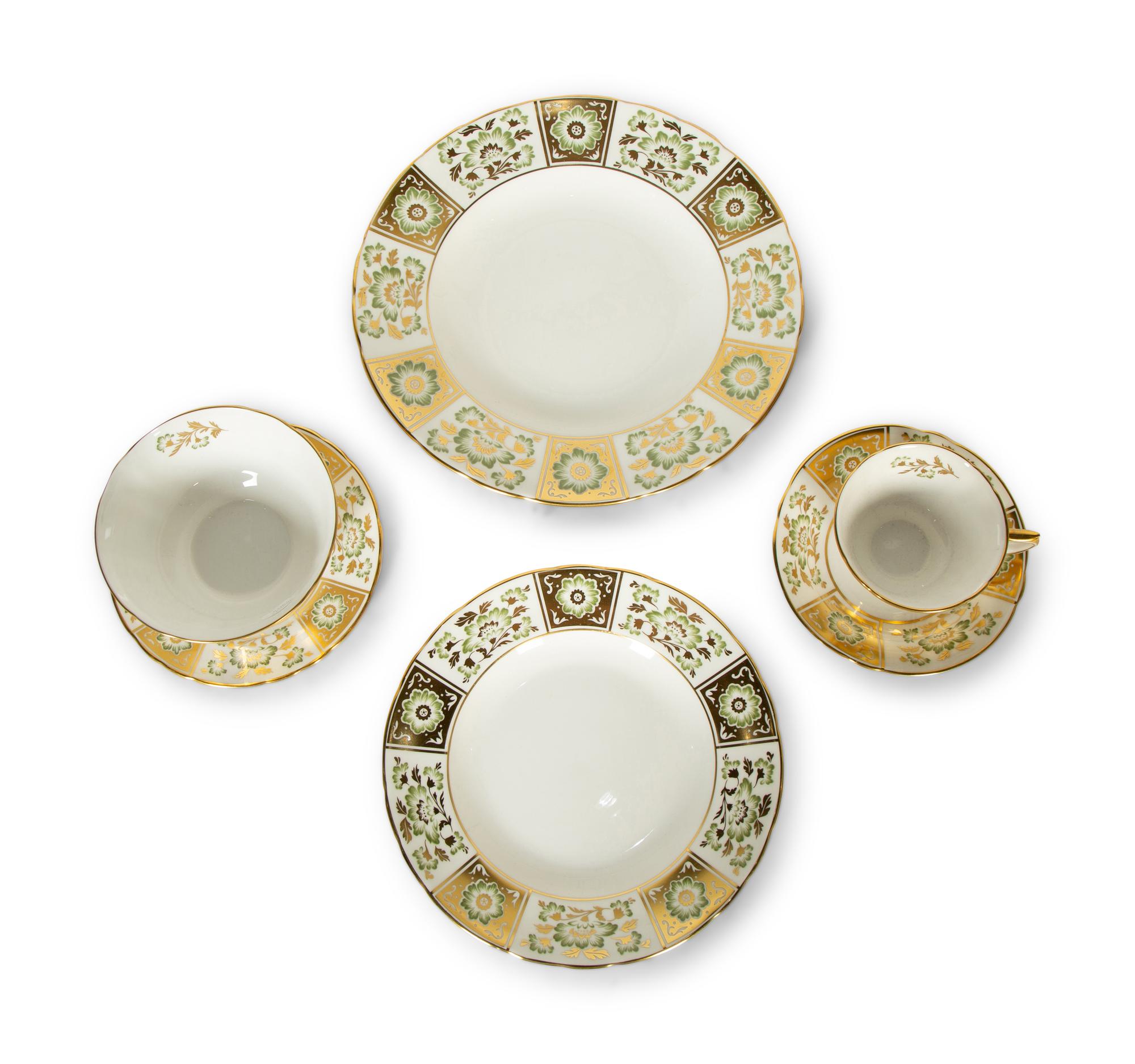 A Royal Crown Derby Porcelain Dinner Service in the Green Derby Panel Pattern