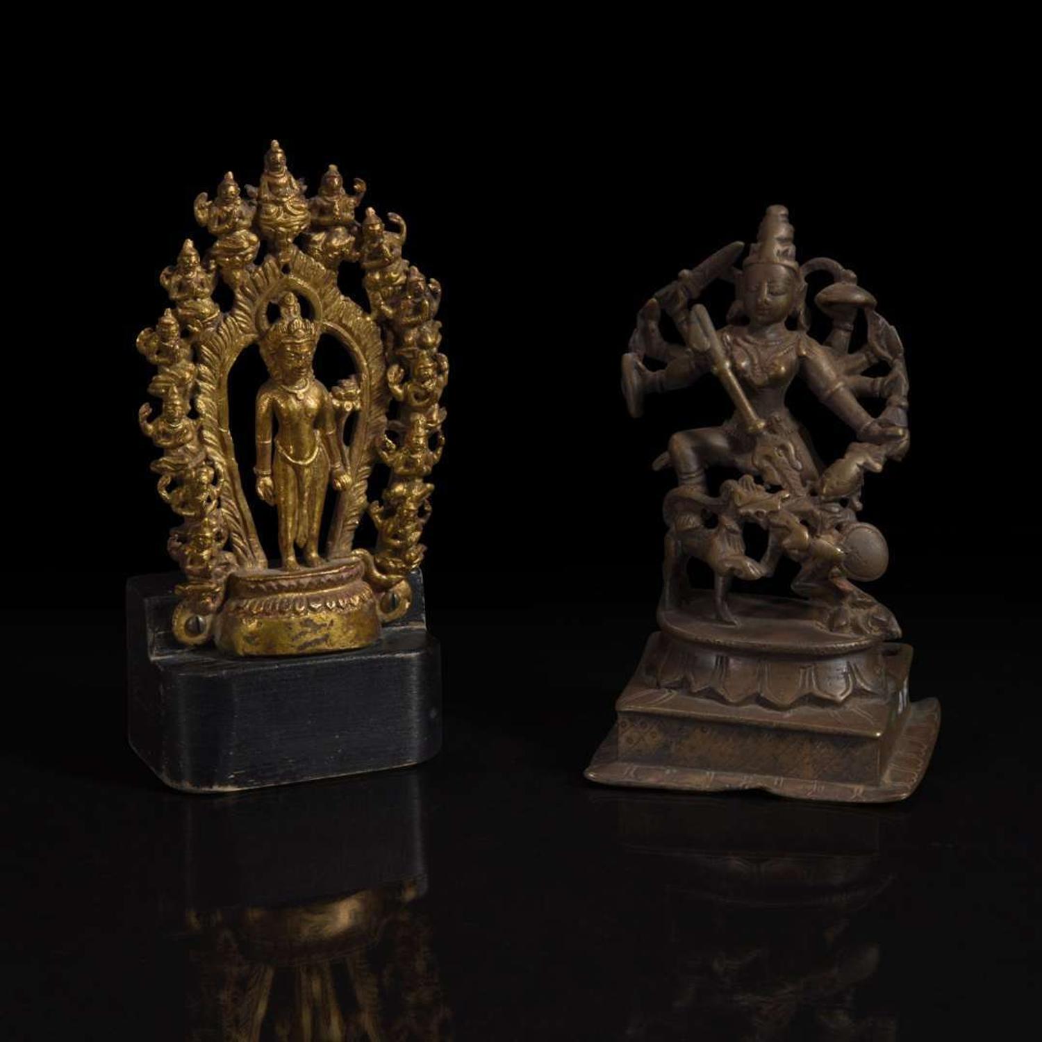 A group of seven assorted Indian and Himalayan bronzes 印度及喜马拉雅铜佛造像一组七件 17th/18th century and later ??????????