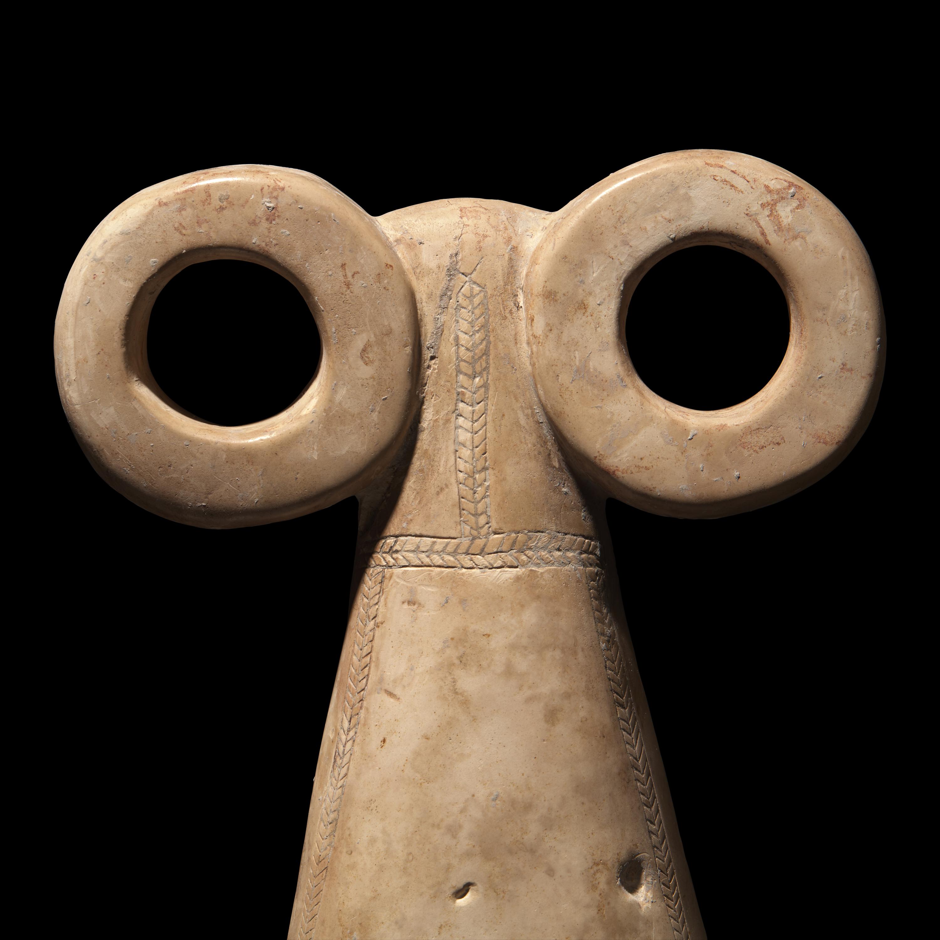 A Mesopotamian Stone Spectacle Idol