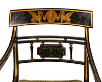 A Set of Four Regency Style Paint Decorated Cane-Seat Armchairs