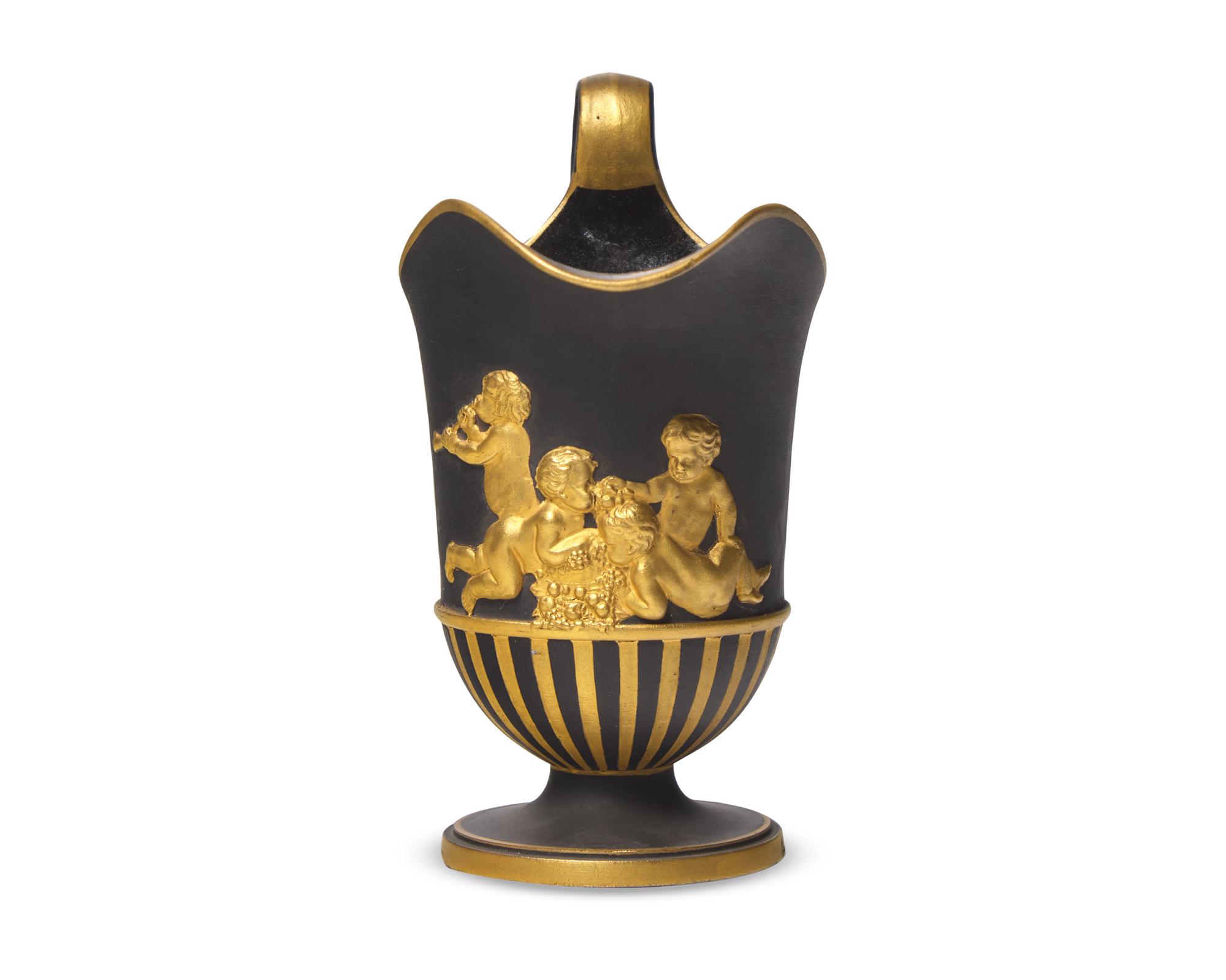 A Wedgwood Parcel-Gilt Black Basalt Creamer
