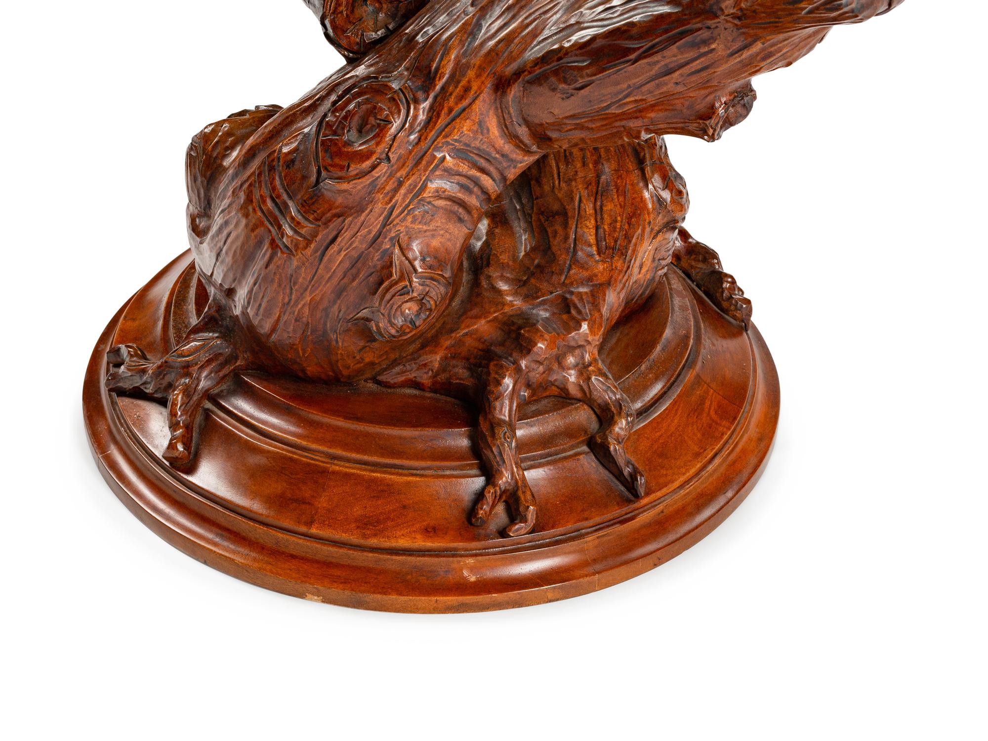 An Italian Grotto Style Carved Walnut Tree Trunk-Form Table Base with Glass Top