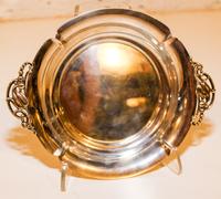 An American Silver Dish, Shreve & Co., San Francisco, CA, of lobed circular form, having stylized floral bud handles.
