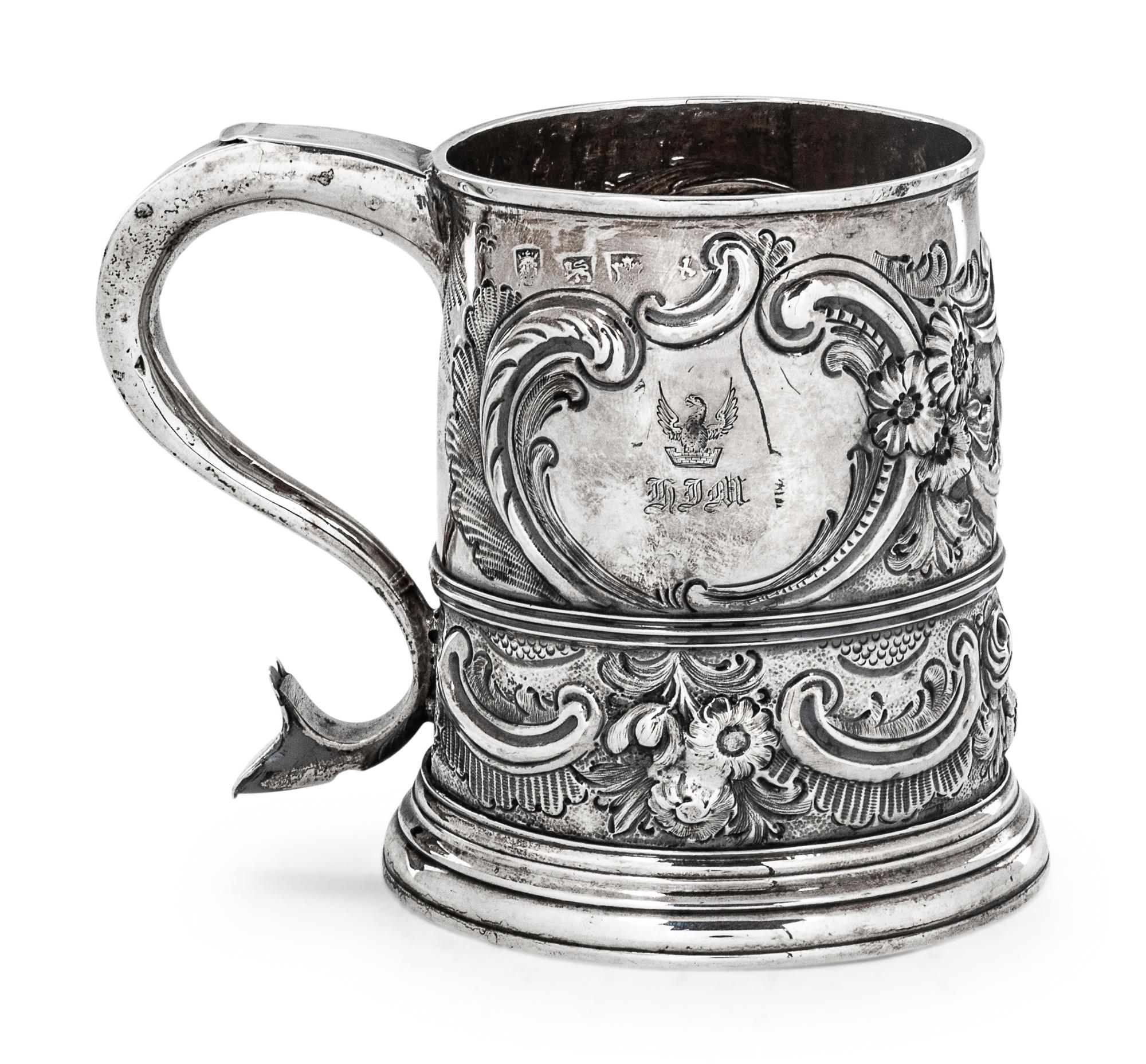 with repousse decoration, monogrammed.
