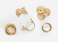 A Collection of Yellow Gold Brooches