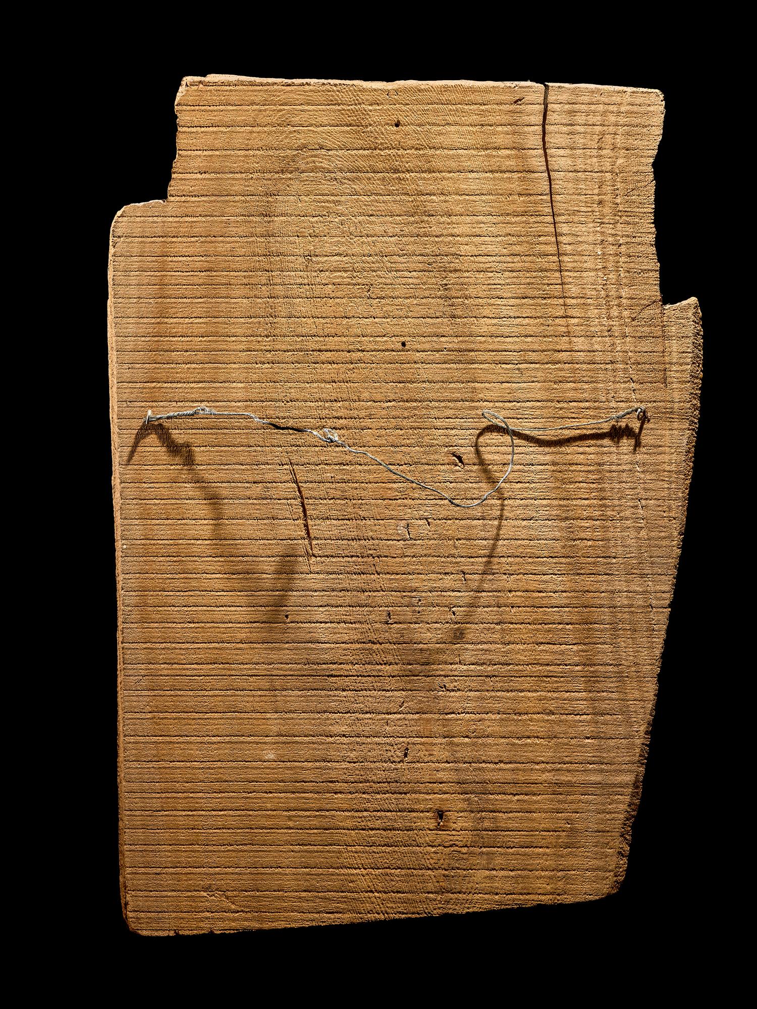 An Egyptian Painted Wood Sarcophagus Fragment with Isis