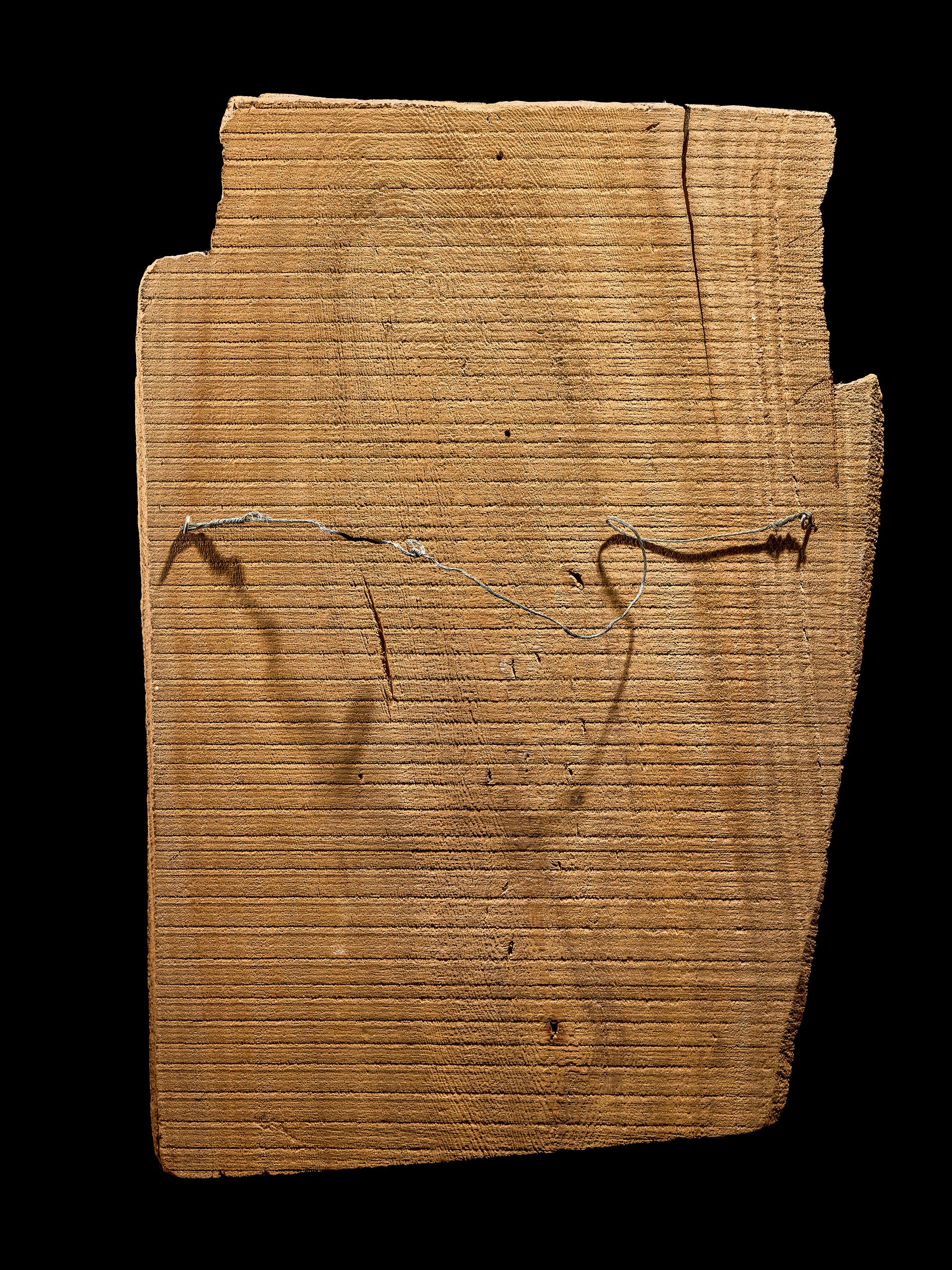 An Egyptian Painted Wood Sarcophagus Fragment with Isis