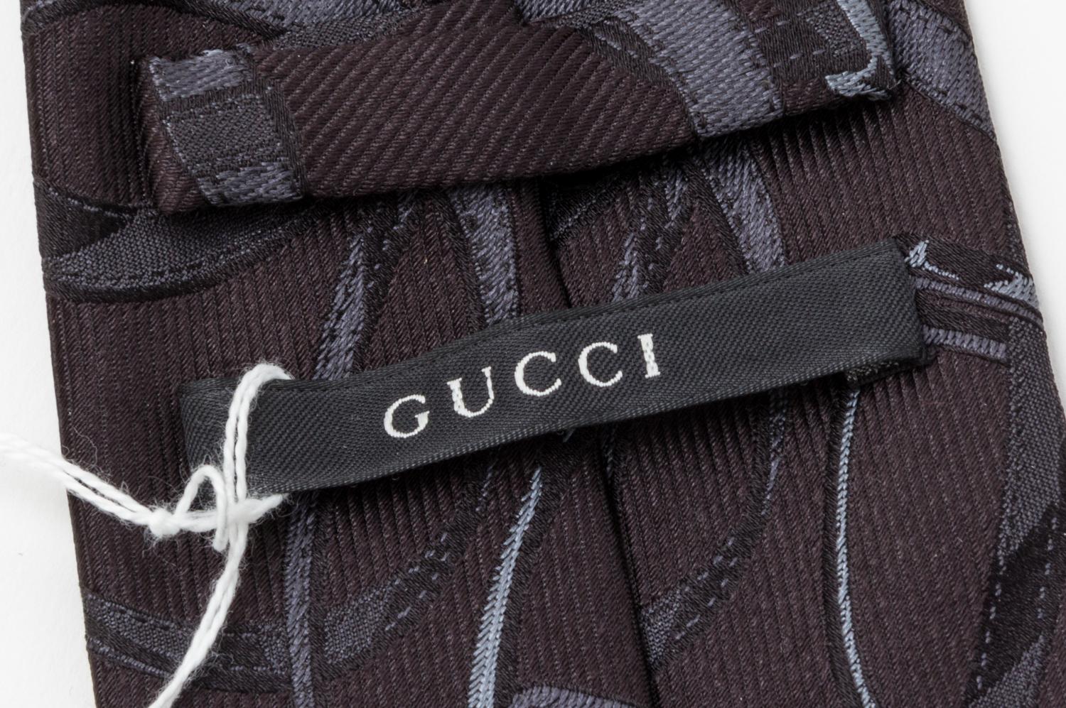A Group of Three Gucci Neckties,