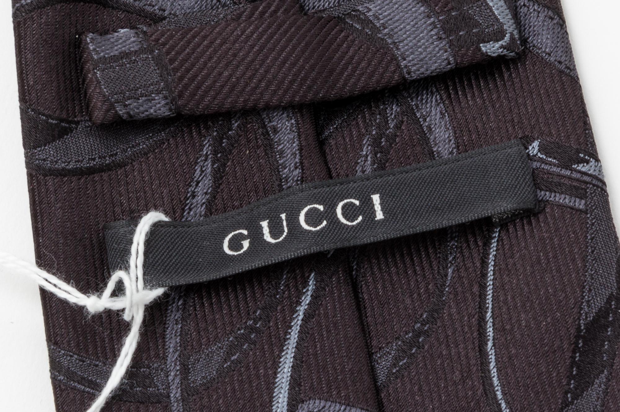 A Group of Three Gucci Neckties,