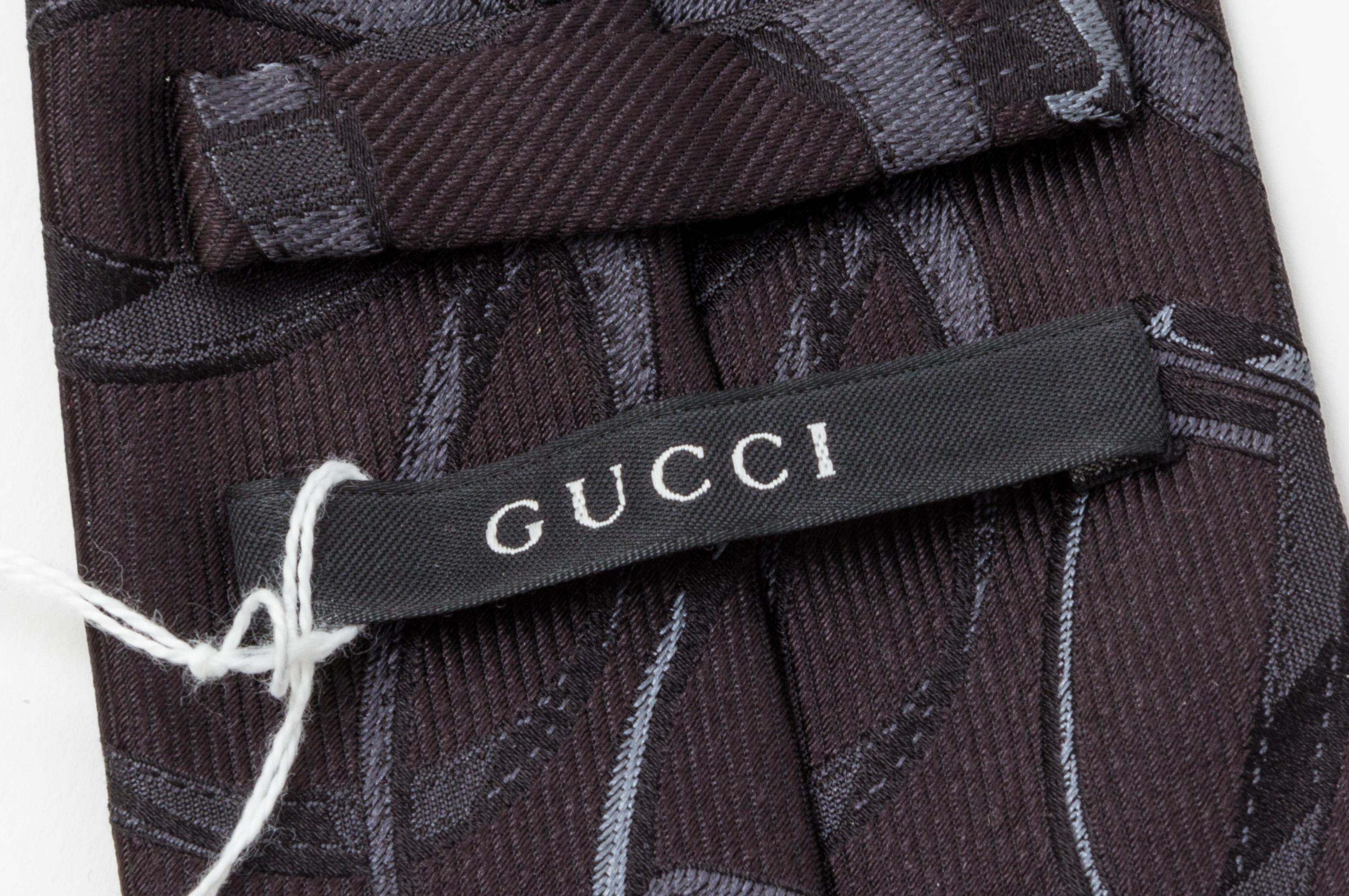 A Group of Three Gucci Neckties,