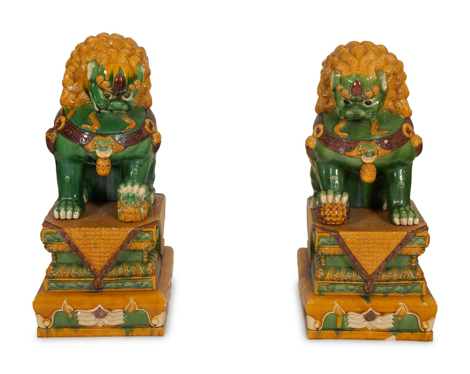 A Large Pair of Sançai-Glazed Porcelain Guardian Lions