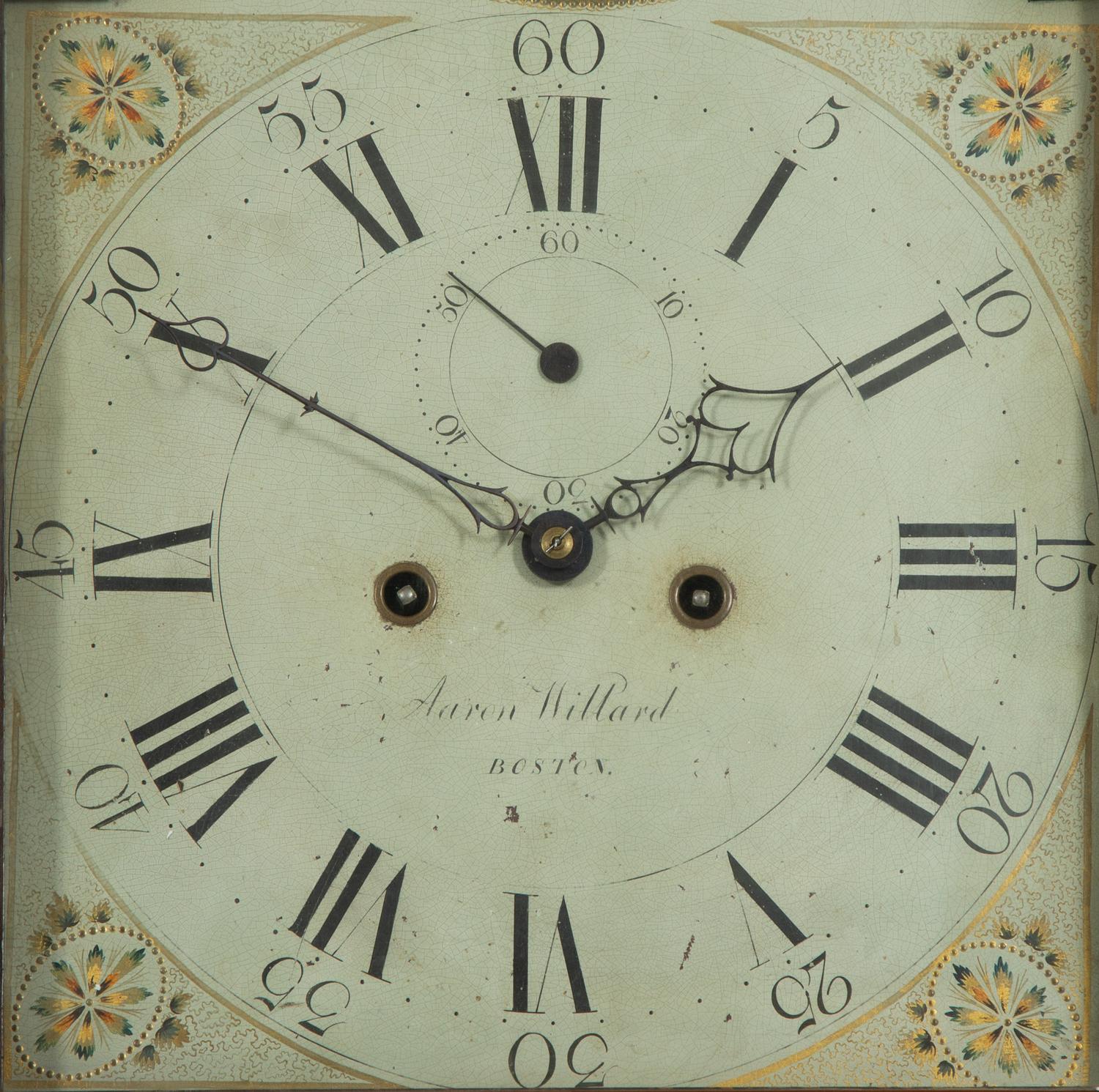 An American Mahogany Brass-Mounted, Inlaid and Carved Mahogany Tall Case Clock