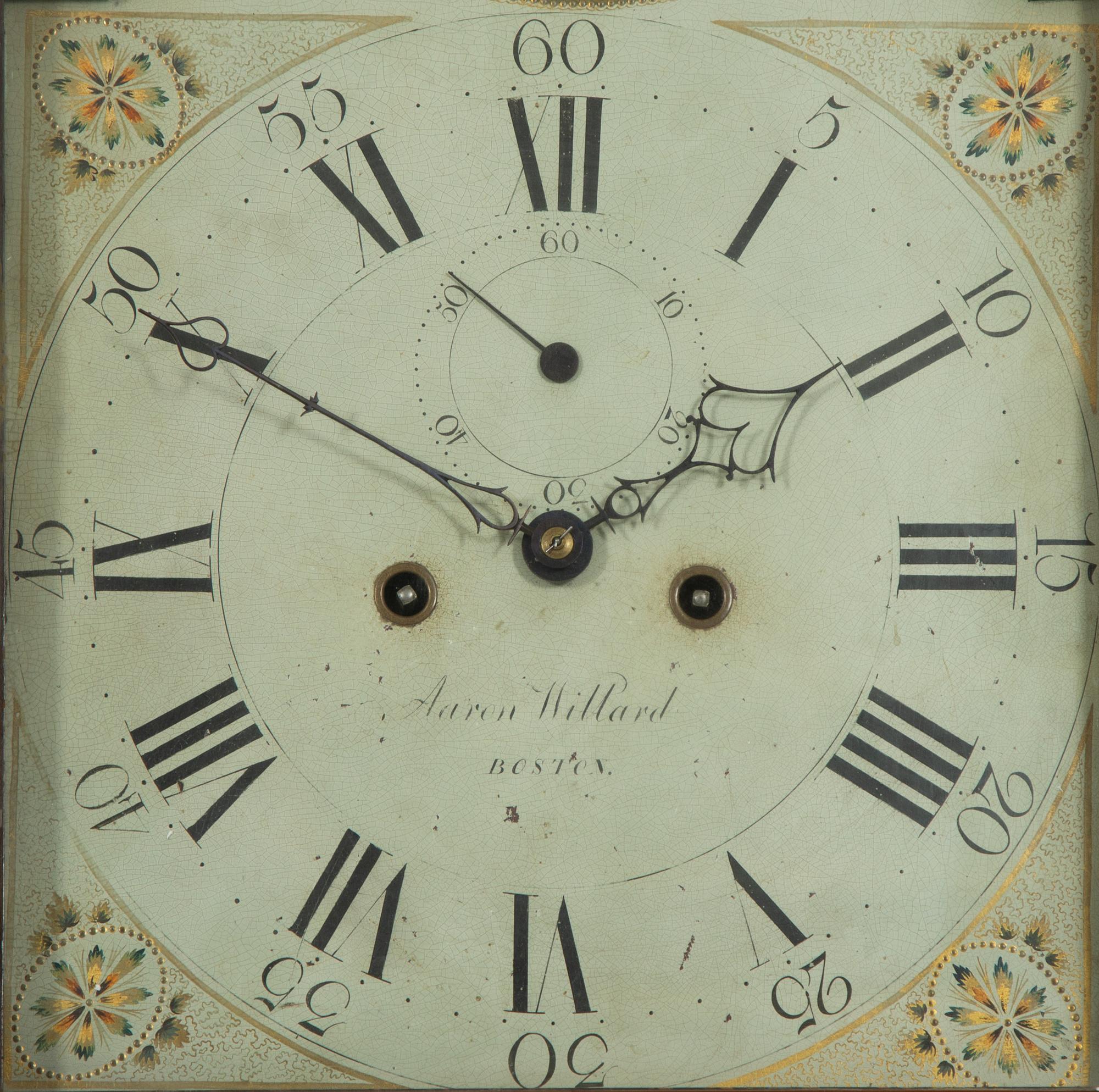 An American Mahogany Brass-Mounted, Inlaid and Carved Mahogany Tall Case Clock